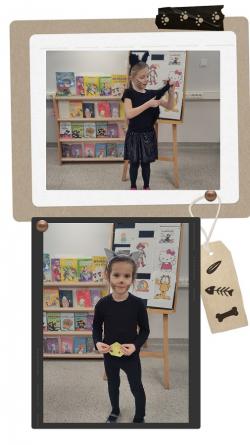 Dzień kota - oddział przedszkolny podczas tematycznych zajęć w bibliotece szkolnej.