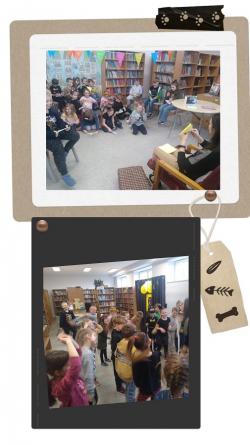 Dzień kota - oddział przedszkolny podczas tematycznych zajęć w bibliotece szkolnej.