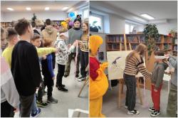 Dzień Kubusia Puchatka w bibliotece szkolnej - uczniowie w trakcie zajęć.